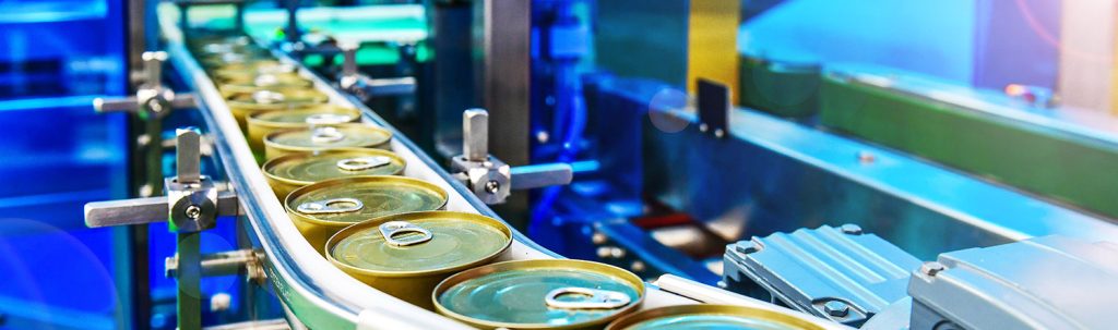 metal packaging machinery showing gold cans on a conveyer system