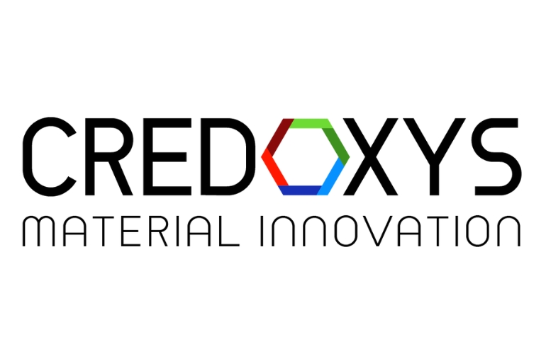 logo credoxys in black with O in multicolour against white background